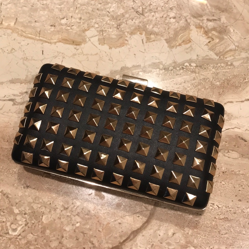 Black and gold studded clutch